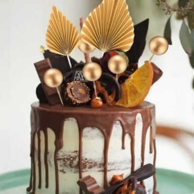 Set of cake toppers: 1 large leaf, 1 small leaf and 5 spheres 0.78" Gold. 7 pieces